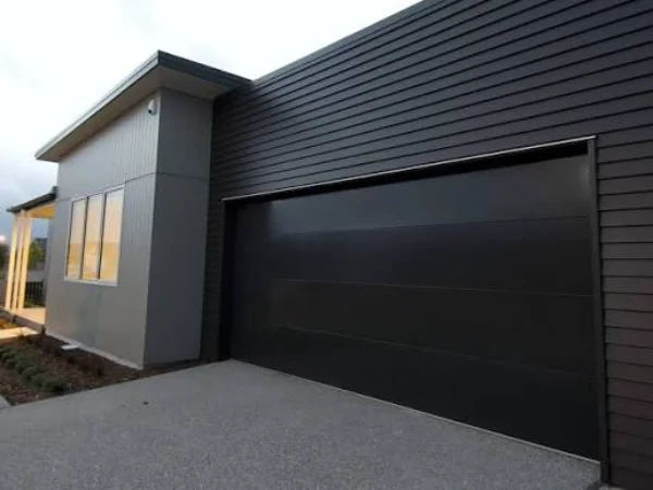 What Usually Prompts a Homeowner to Replace a Garage Door Rather Than Repair It